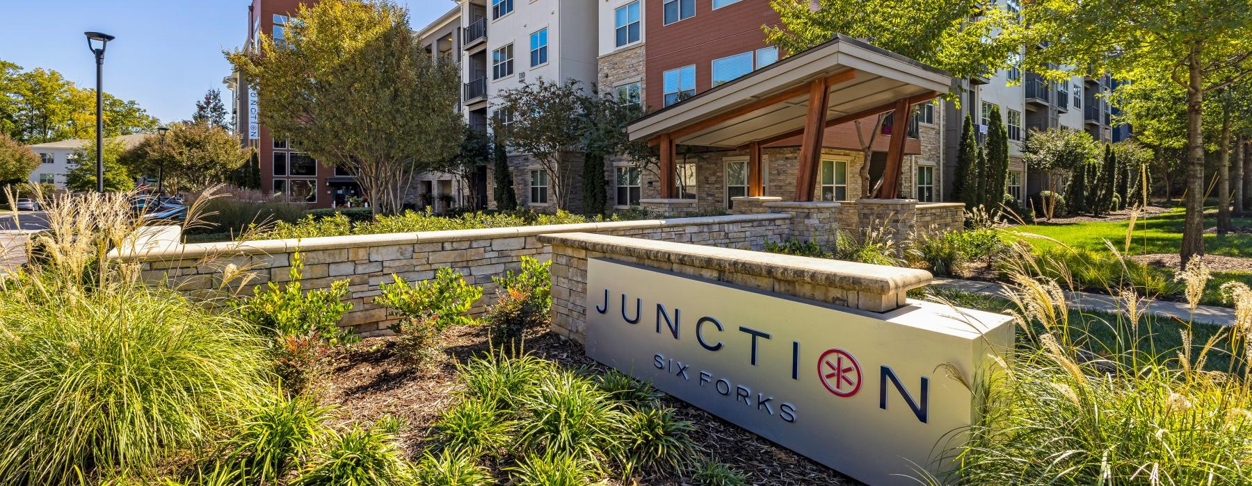 a sign in front of a building