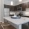 a kitchen with black cabinets