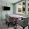 a room with a table and chairs