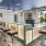 a kitchen with a bar and stools